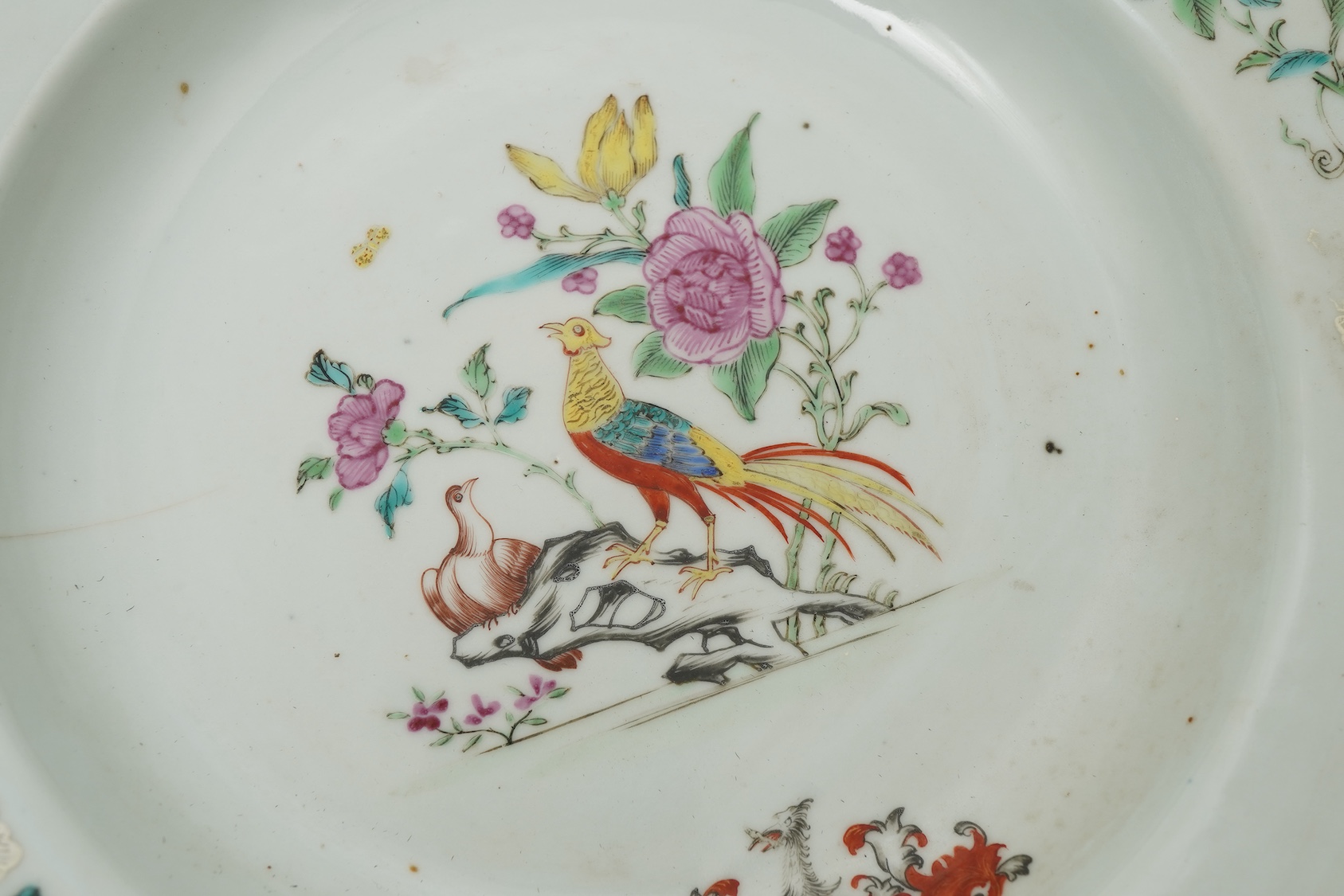 A pair of Chinese famille armorial plates, Qianlong, c.1750